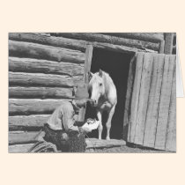 Cowboy lisant une lettre avec un cheval cartes