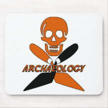 Crâne et archéologie croisée de truelles tapis de souris