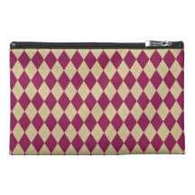 Crème et sac à motifs de losanges magenta foncé d' trousse de voyage
