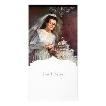 Cru la belle jeune mariée et son gâteau de mariage photocarte