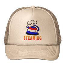 Cuisant la théière à la vapeur - thé casquette