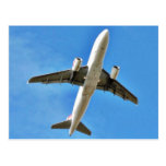 Décollage d'avion sur le ciel bleu cartes postales