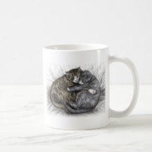 Deux chats étreignant et faisant une sieste ensemb mug à café