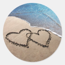 Deux coeurs dans le sable autocollants