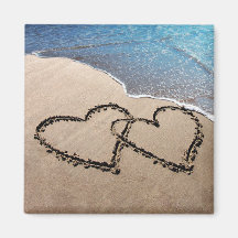Deux coeurs dans le sable magnets