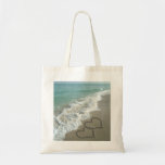 Deux coeurs de sable sur la plage, océan romantiqu sacs
