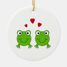 Deux grenouilles vertes avec les coeurs rouges ornements de noël