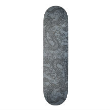 Dragon de relief sur la texture en cuir grise plateau de skateboard