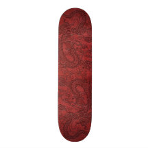 Dragon de relief sur la texture en cuir rouge planches à roulettes