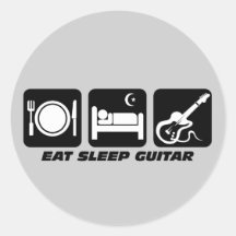 Drôle mangez la guitare de sommeil autocollant rond