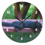 Écureuil noir pendule murale