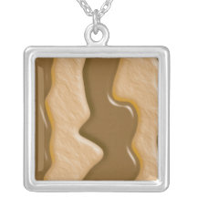 Égouttements - beurre d'arachide de chocolat pendentif