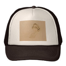 Empreinte de pas sur la plage casquettes