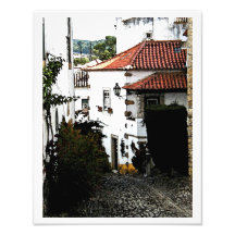 En bas de la rue dans Obidos Portugal Tirage Photo