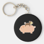 Équitation de singe de bébé sur un porc porte-clefs