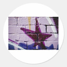 Étoile abstraite de graffiti sur le mur texturisé autocollants ronds