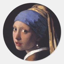 Fille avec une boucle d'oreille de perle autocollants