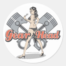 Fille de pin-up de rockabilly avec des pistons autocollants ronds