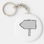Flèche de poteau indicateur. Gris, noir et blanc. Porte-clef