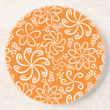 Fleurs et caboteur oranges géniaux de feuille dessous de verre