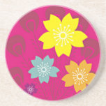 fleurs et plumes de paon sur le fuschia dessous de verre