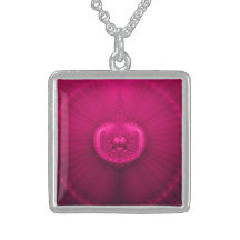 Fractale ornée de bijoux fuchsia de médaillon
