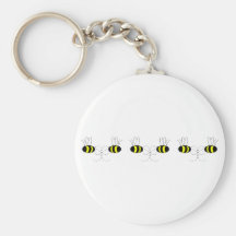 Gaffez les arcs d'abeille dans une rangée Keychain Porte-clé