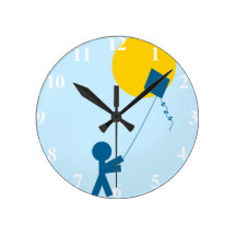 Garçon avec l'horloge murale de cerf-volant