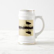 Grands hérons/tasse d'aube