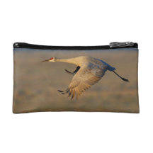 grue de sandhill en vol trousse make-up