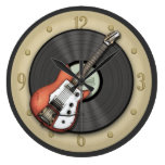 Guitare vintage et horloge murale de disque vinyle