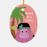 Hippopotame rose avec un palmier ornements de noël