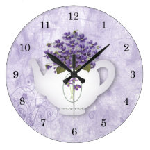 Horloge murale de théière de violettes