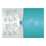Invitation décorée d'un monogramme bleue et argent