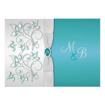 Invitation décorée d'un monogramme bleue et argent