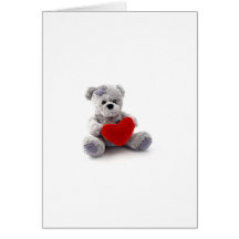 Jouet d'ours de nounours tenant un coeur sur l'arr carte