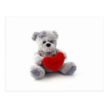Jouet d'ours de nounours tenant un coeur sur l'arr cartes postales