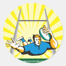 joueur de rugby plongeant pour marquer un essai autocollant rond