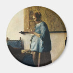 La femme de Vermeer dans le bleu lisant une lettre Aimant