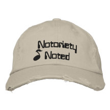 La notoriété a noté le chapeau brodé par musique