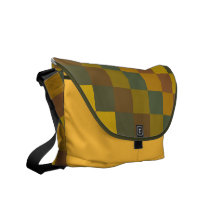 La terre colorée checkered sur le sac de safran besaces