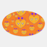 L'amour orange de Lovebugs branche des produits su Autocollant Ovale