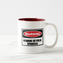 L'avertissement PRENNENT GARDE de la tasse d'ÉPAGN