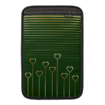 Le coeur d'or refoule la douille d'air verte de Ma Poches Macbook