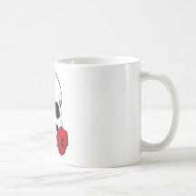 Le crâne avec s'est levé mug à café