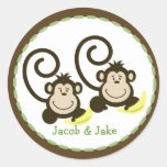 Le jumeau Monkeys autour de l'autocollant de faveu autocollants