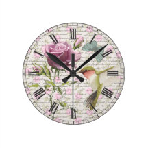 Le papillon vintage de colibri et s'est levé horloge