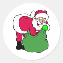 Le père noël atteint dans le paquet autocollants