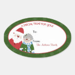 Le père noël et Mme Claus Oval Baking Labels autocollants
