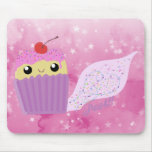Le pet de petits gâteaux arrose tapis de souris